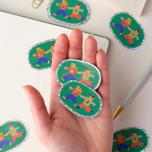 Claire Paul Holografischer Aufkleber – Junge und Mädchen