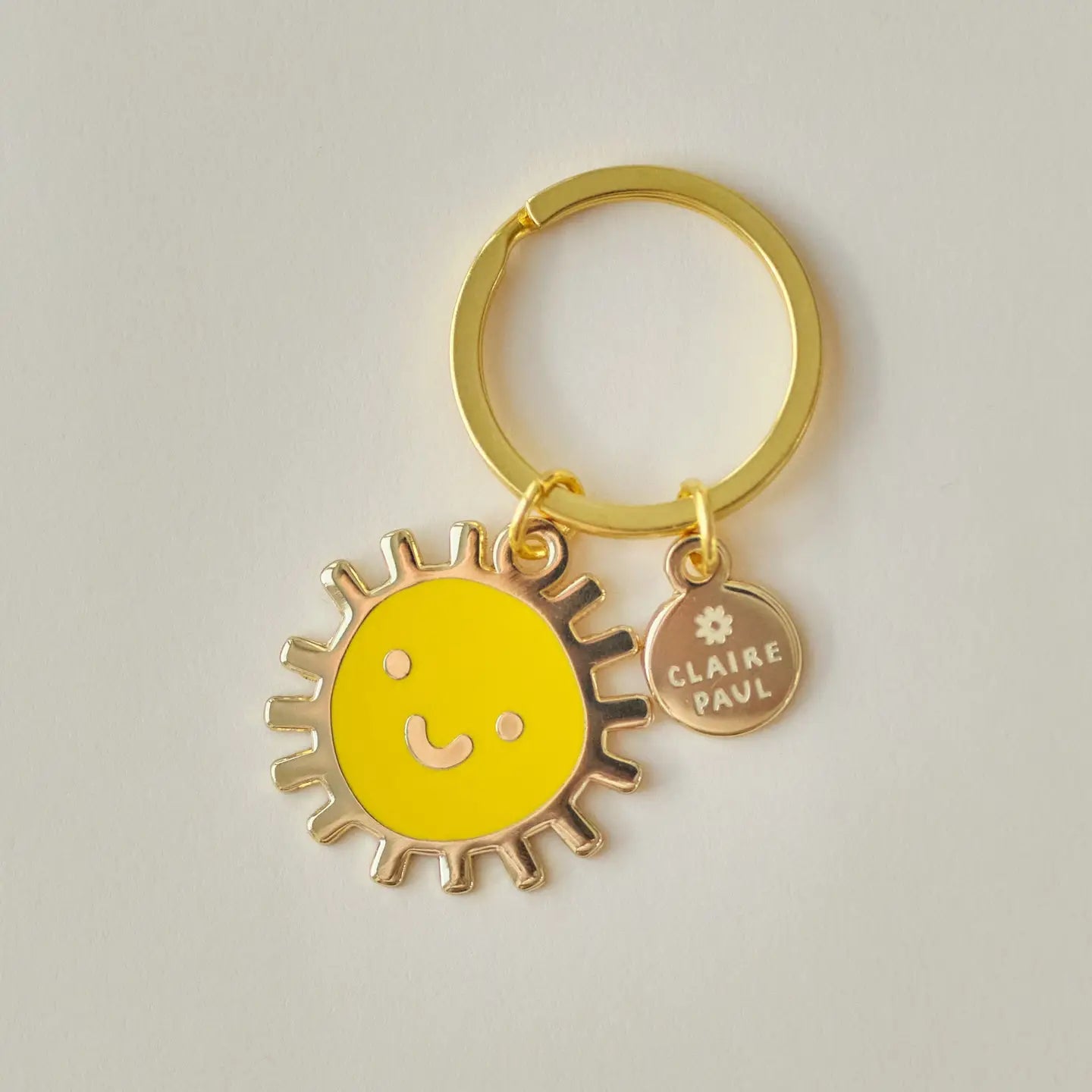 Sleutelhanger bagcharm emaille Smiley Zon - Claire Paul