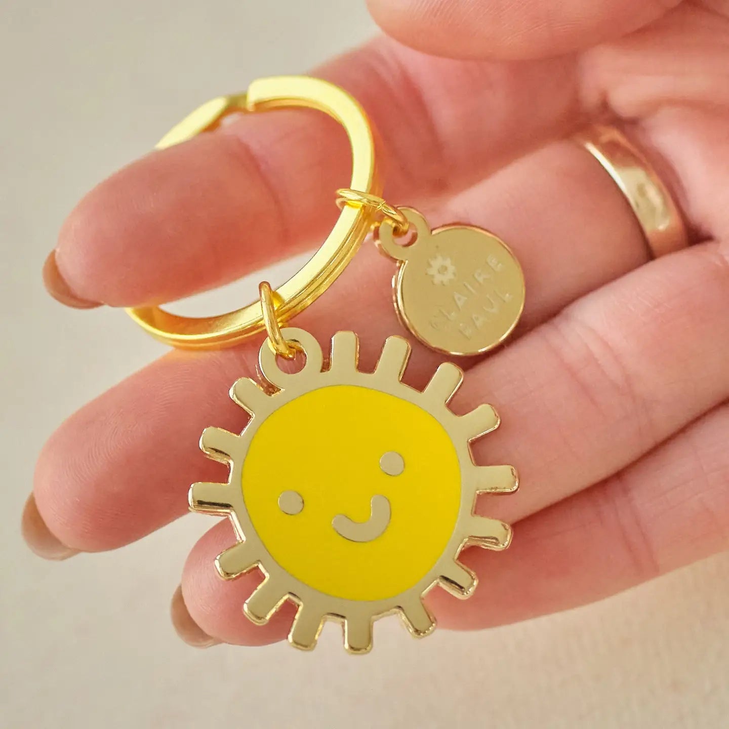 Sleutelhanger bagcharm emaille Smiley Zon - Claire Paul