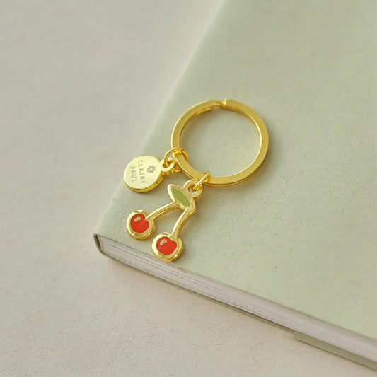 Sleutelhanger emaille Kersen bedel Goud - Claire Paul